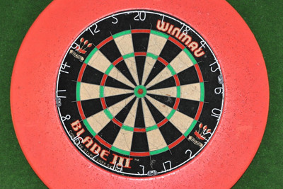 Dartboard with Red and Green Background