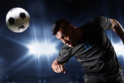 Footballer Heading Ball