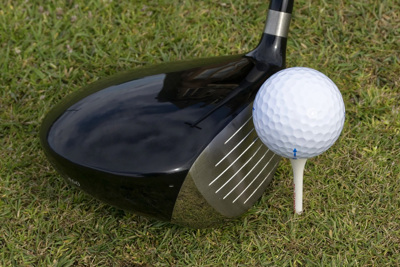 Golf Ball on Tee with Driver